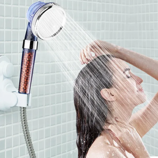 The Snughob filtered shower head in use, fitted to a standard shower hose